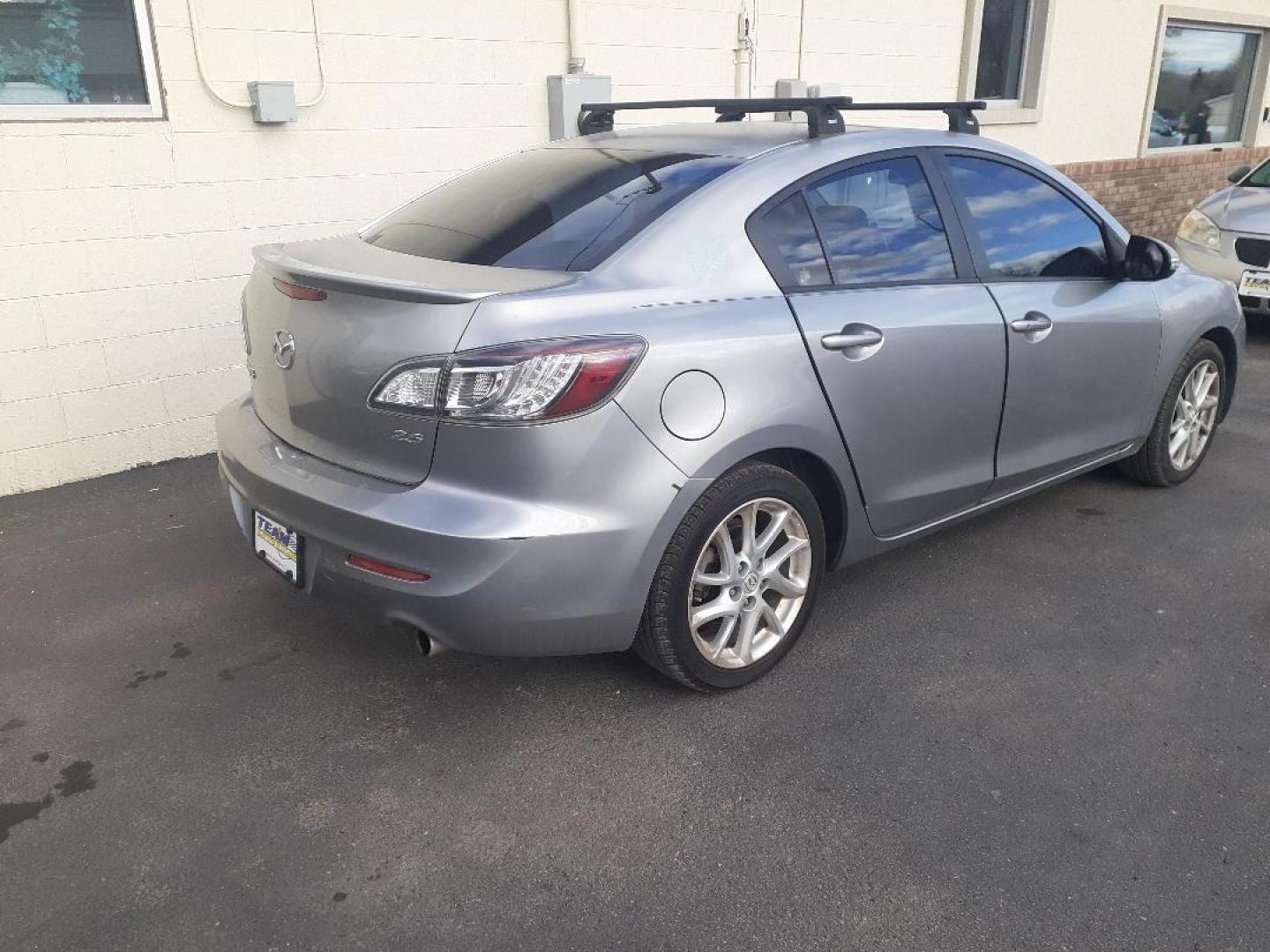 2012 Mazda MAZDA3 s Grand Touring 4-Door (JM1BL1W64C1) with an 2.5L L4 DOHC 16V engine, located at 2015 Cambell Street, Rapid City, SD, 57701, (605) 342-8326, 44.066433, -103.191772 - CARFAX AVAILABLE - Photo#2